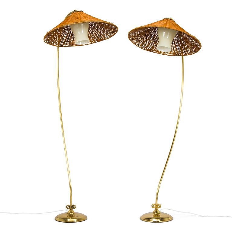 A pair of mid-20th century floor lamps.
