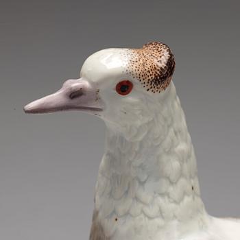 A porcelain figure of a dove, possibly Samson.