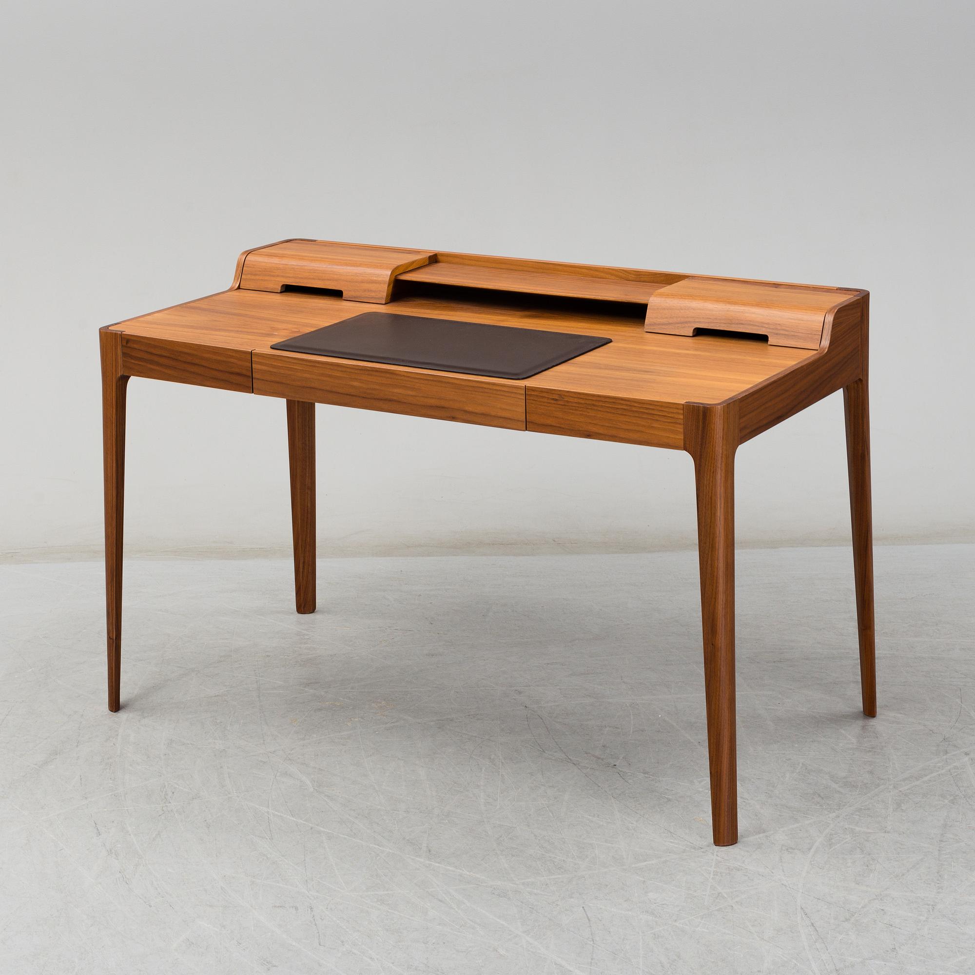 A 21st Century walnut 'Saffo' writing desk by Carlo Ballabio, from Porada.