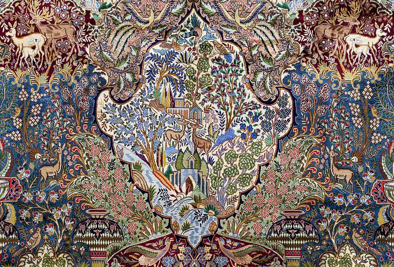 A Kashmar figural carpet. Circa 390 x 300 cm.