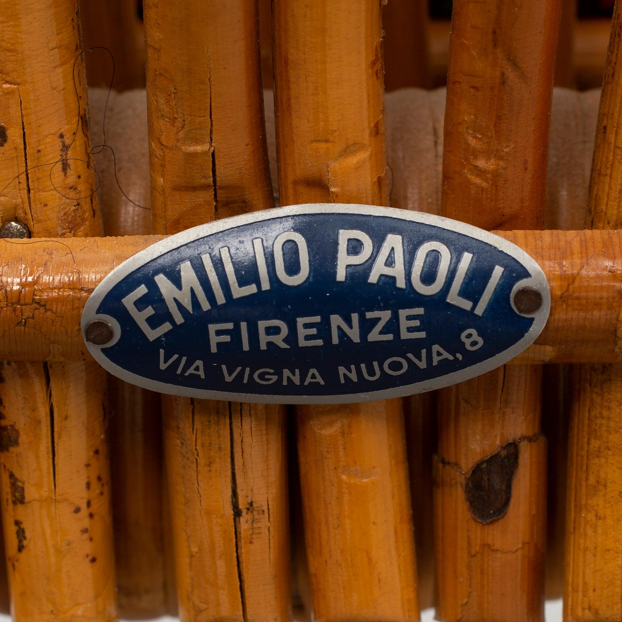 A pair of rattan armchairs, Emilio Paoli, via Vigna Nuova, 8, Firenze, Italy, second half of the 20th century. Signed.