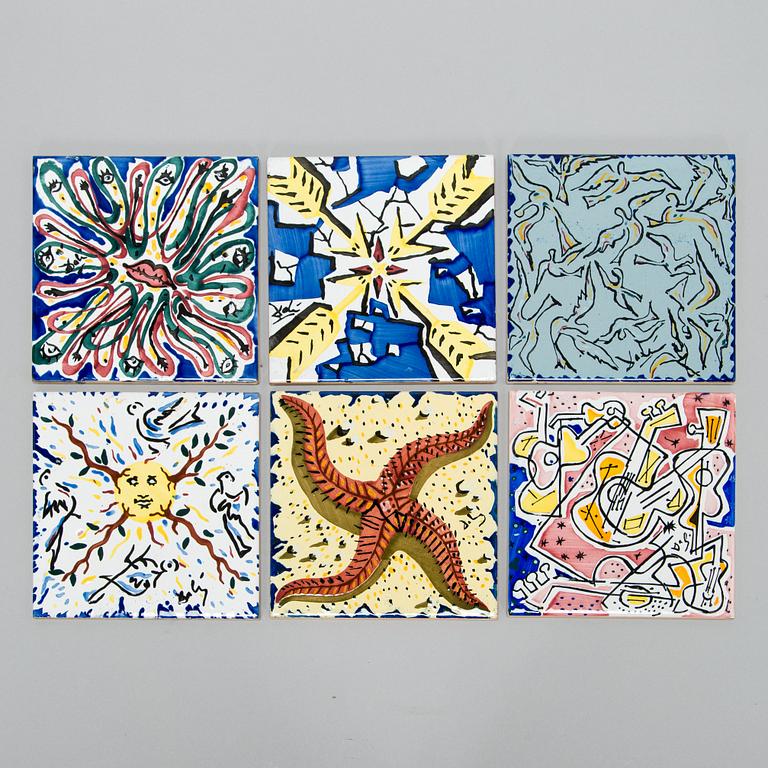 A set of six earthenware tile plates, after Salvador Dalí, late 20th century.