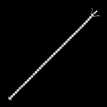 ARMBAND, 18 k vitguld, rivièrelänk, 42 briljantslipade diamanter tot ca 9.11 ct.
