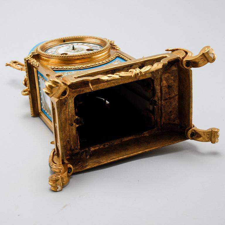 A 19th century mantle piece clock in Louis XVI-style.