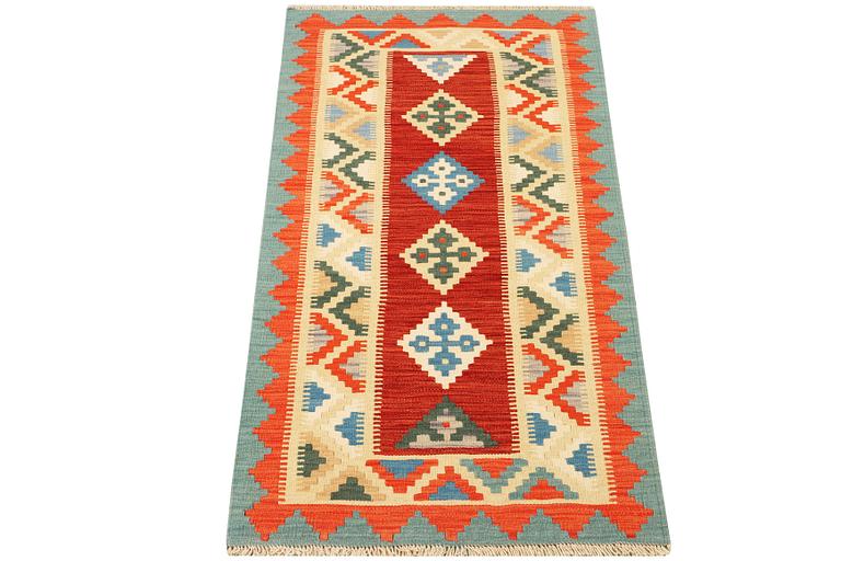 A Kilim runner carpet, c. 196 x 88 cm.