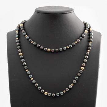 A cultured pearl necklace with 14K gold beads.