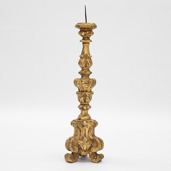 A giltwood Baroque pricket candlestick, circa 1700.