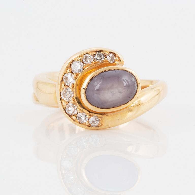 OLLE OHLSSON, 18K gold ring with star sapphire and diamonds.