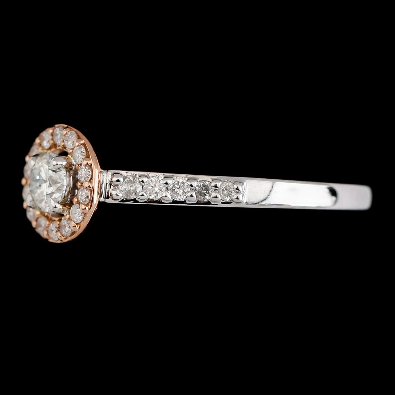 RING, 14K vitguld/roséguld, diamanter tot ca 0.50 ct.