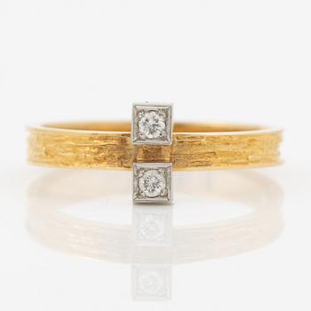 Björn Weckström, Ring, 18K gold set with round brilliant-cut diamonds, Finland 1975. By Lapponia.