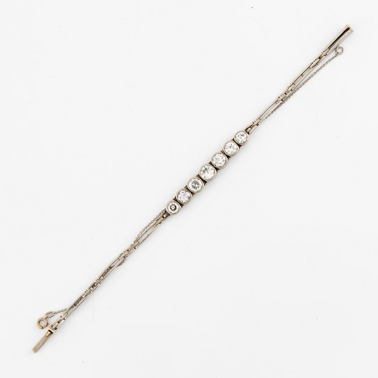 A bracelet in 14K white gold set with old-cut diamonds.