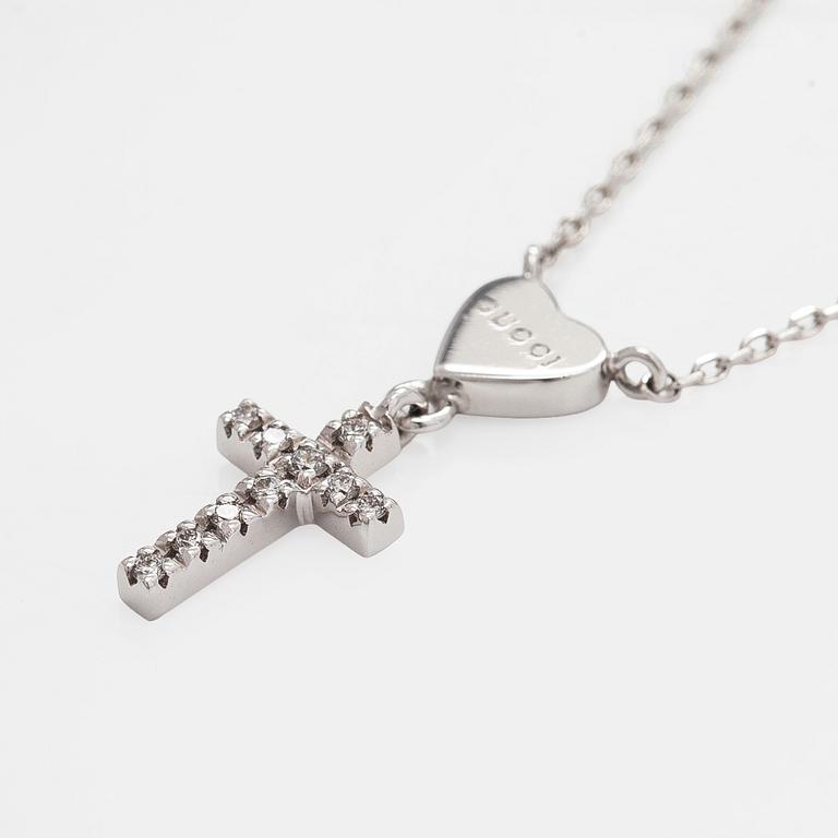 Gucci, an 18K white gold necklace with diamonds.