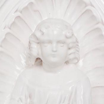 A ceramic wall relief, circa 1900.