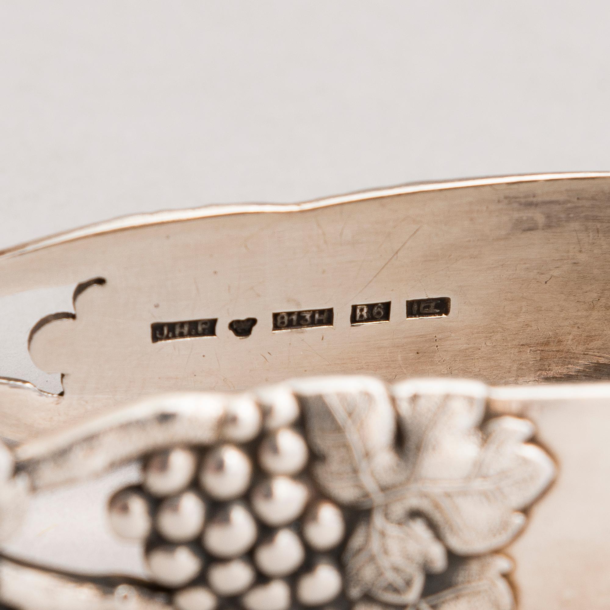 A silver sugar tong and a 3-piece silver coffee set, mark of Juho H. Pekuri, Oulu 1931 and Finnish import marks 1938.