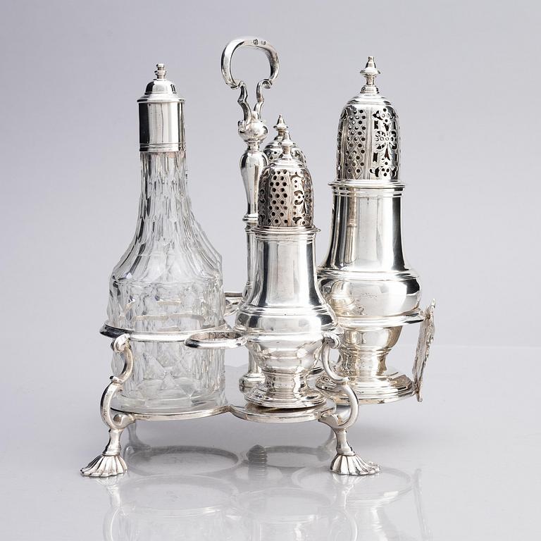 An English 18th century silver and glass cruet-set, mark of Jabez Daniel, London 1777 and possibly 1783.