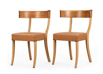 93. A pair of Josef Frank walnut, beech and brown leather chairs, Svenskt Tenn, model 300.