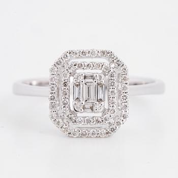 Baguette and brilliant-cut diamond ring.