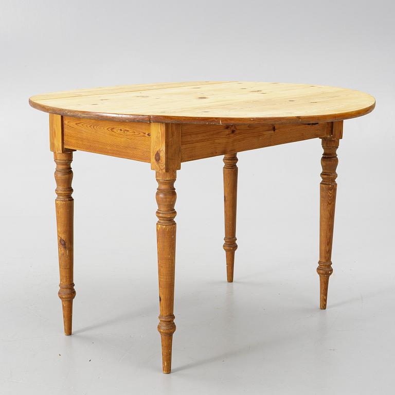 A folding table, early 20th Century.