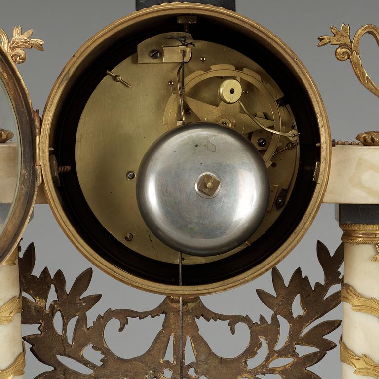 A Louis XVI late 18th Century mantel clock.