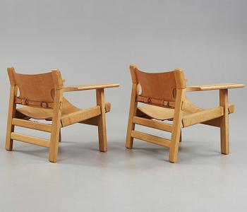 A pair of Børge Mogensen oak and leather 'Spanish Chair', Fredericia Møbelfabrik, Denmark.