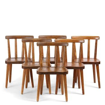 257. Axel Einar Hjorth, a set of six stained pine "Utö" chairs, Nordiska Kompaniet, Sweden, 1930s.