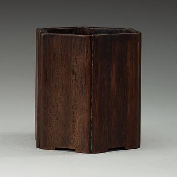 A Chinese wooden brush pot with inscriptions, 20th Century.