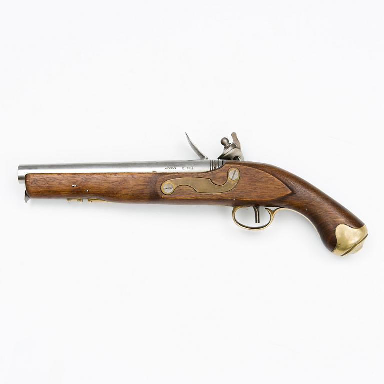 A replica flintlock pistol marked Tower Japan, second half of 20th Century.