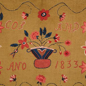 A carriage cushion, embroidered, ca 51-52 x 104,5-107 cm, signed and dated COS BMD ANO 1833, Scania.