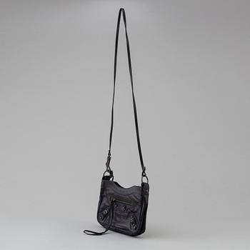 A black alligator printed leather "Classic hip" bag by Balenciaga.