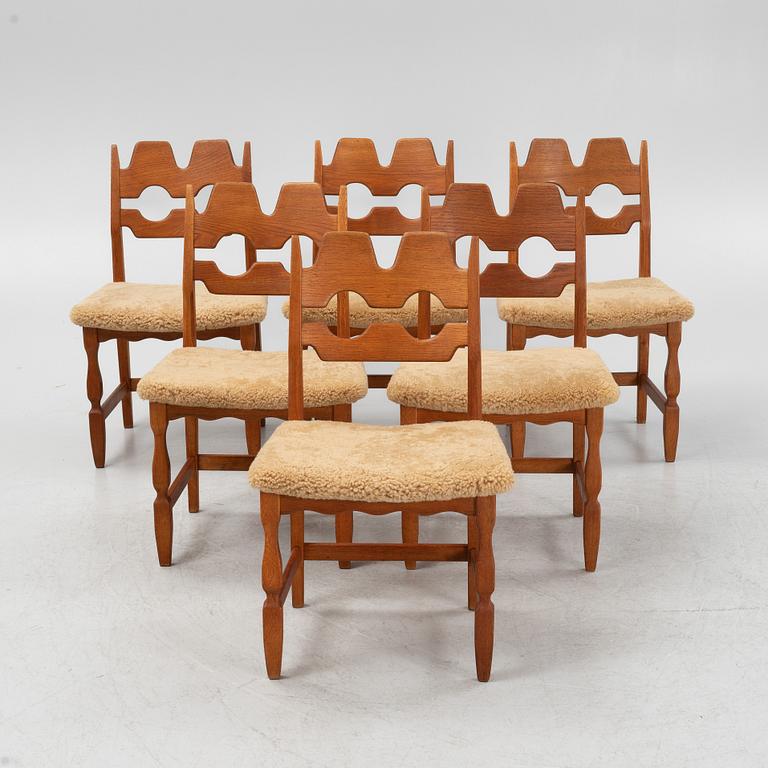 Henning Kjærnulf, a set of six oak 'Razorblade' chairs with new sheepskin upholstery, Nyrups, Denmark, 1960s.