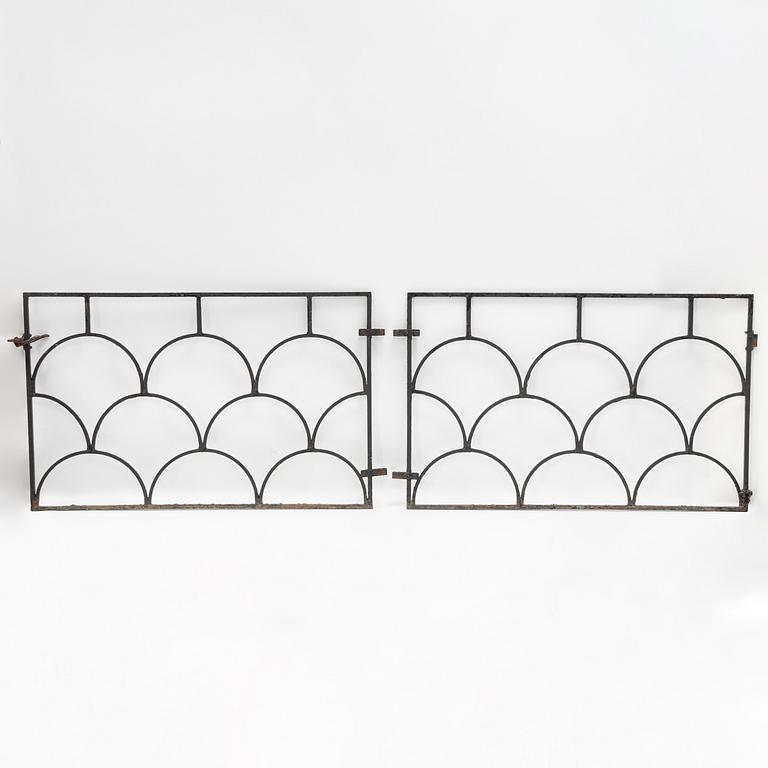 A pair of cast iron gates, 1930's.