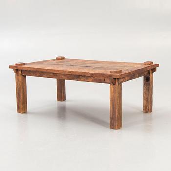 A wooden coffee table later part of the 20th century.