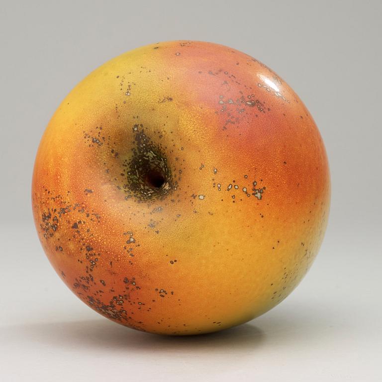 A Hans Hedberg faience sculpture of an apple, Biot, France.