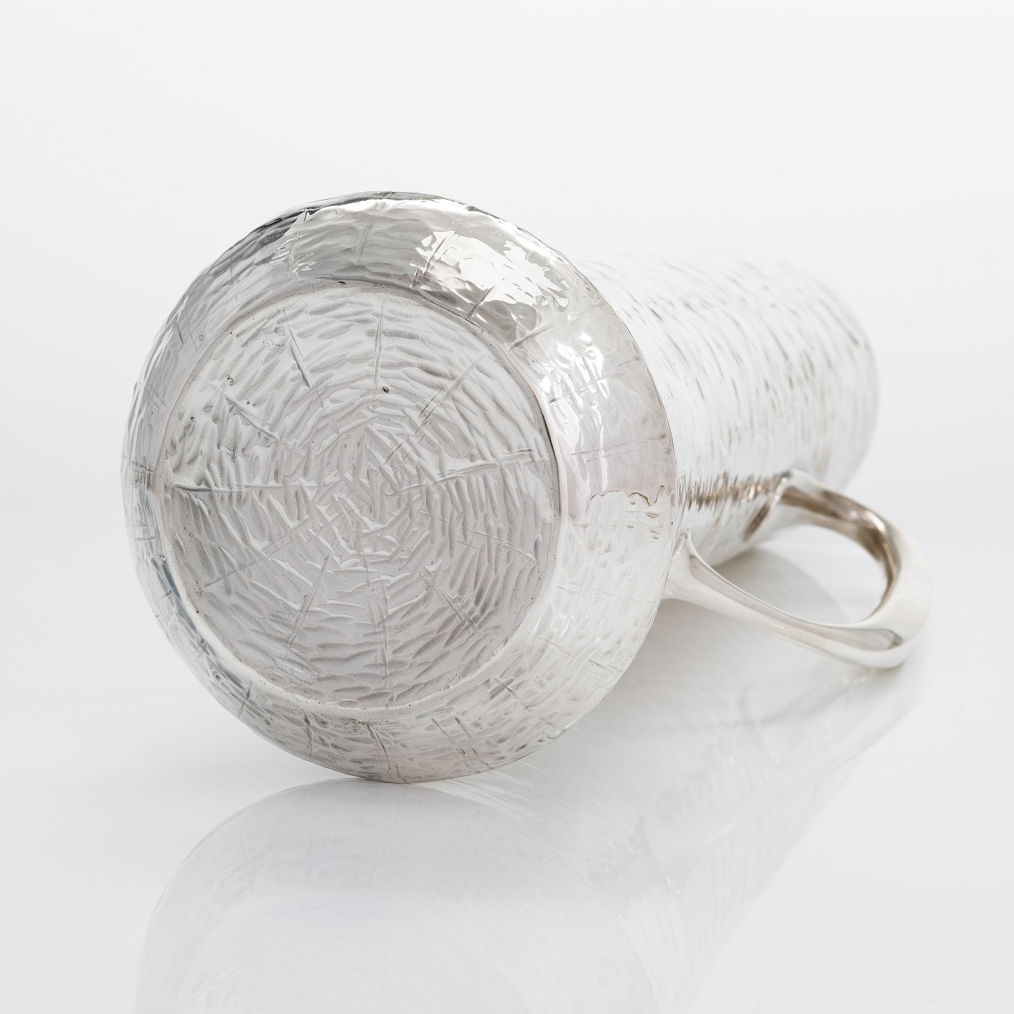Tapio Wirkkala, a silver pitcher with six silver beakers, marked TW, Kultakeskus, Hämeenlinna Finland 1973 and 1966.