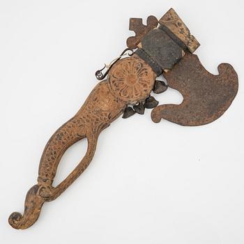 A set of three ceremonial Asmat axes and a sculpture object, Jakarta, Indonesia, 20th Century.