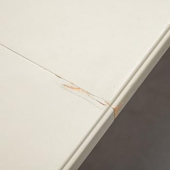 A dining table and six chairs by Carl Malmsten for Bodafors.