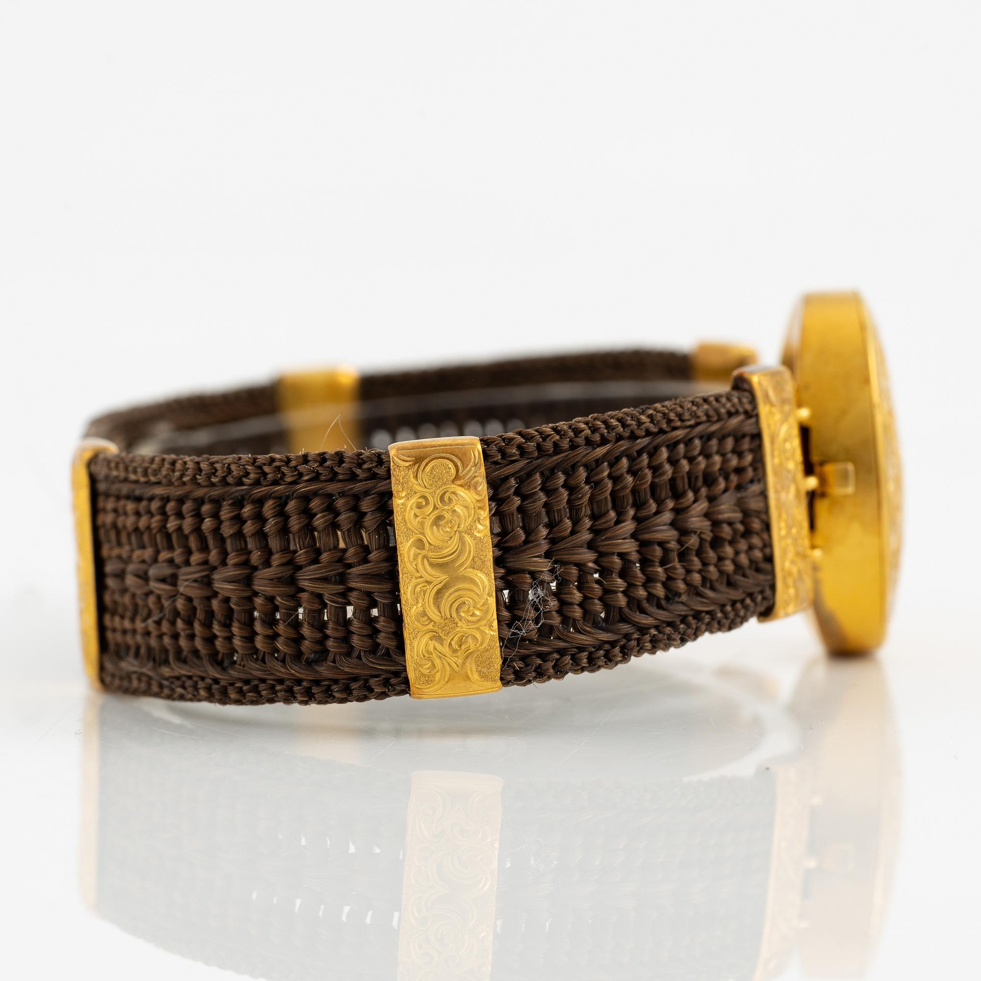 Armband hårarbete och 14K guld.