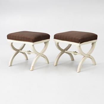 A pair of late Gustavian carved stools by E. Öhrmark (master in Stockholm 1777-1813).