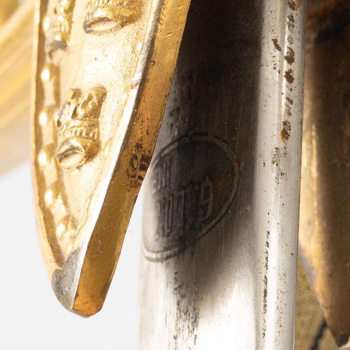A Swedish artillery officer's sabre, 1889 pattern with scabbard.
