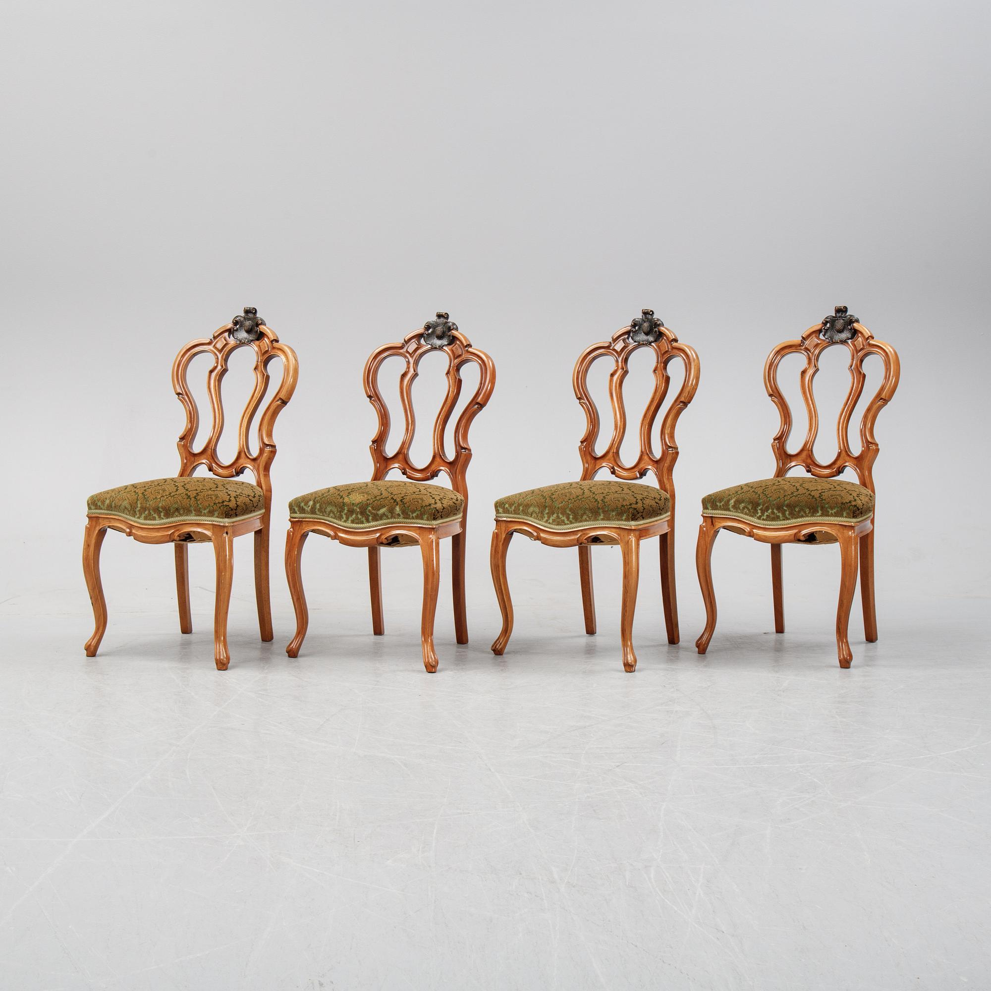 A rococo style sofa, four chairs and a table, second half of the 19th Century.