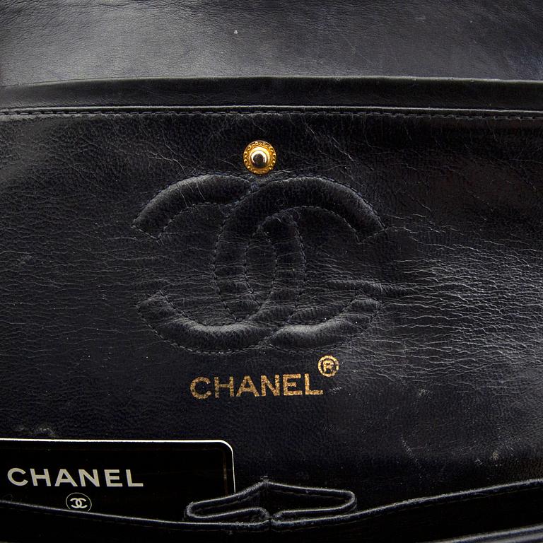 Chanel, a "Double Flap Bag".