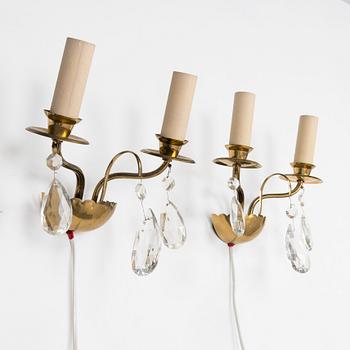 Four of mid-20th century wall sconces.