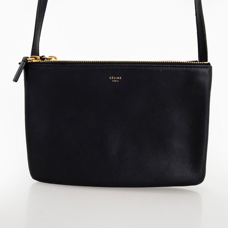 Céline, a black leather 'Trio Small' bag.