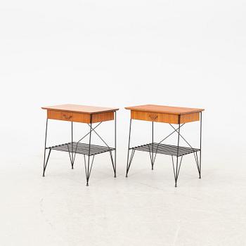 A pair of 1950s teak bedside tables.