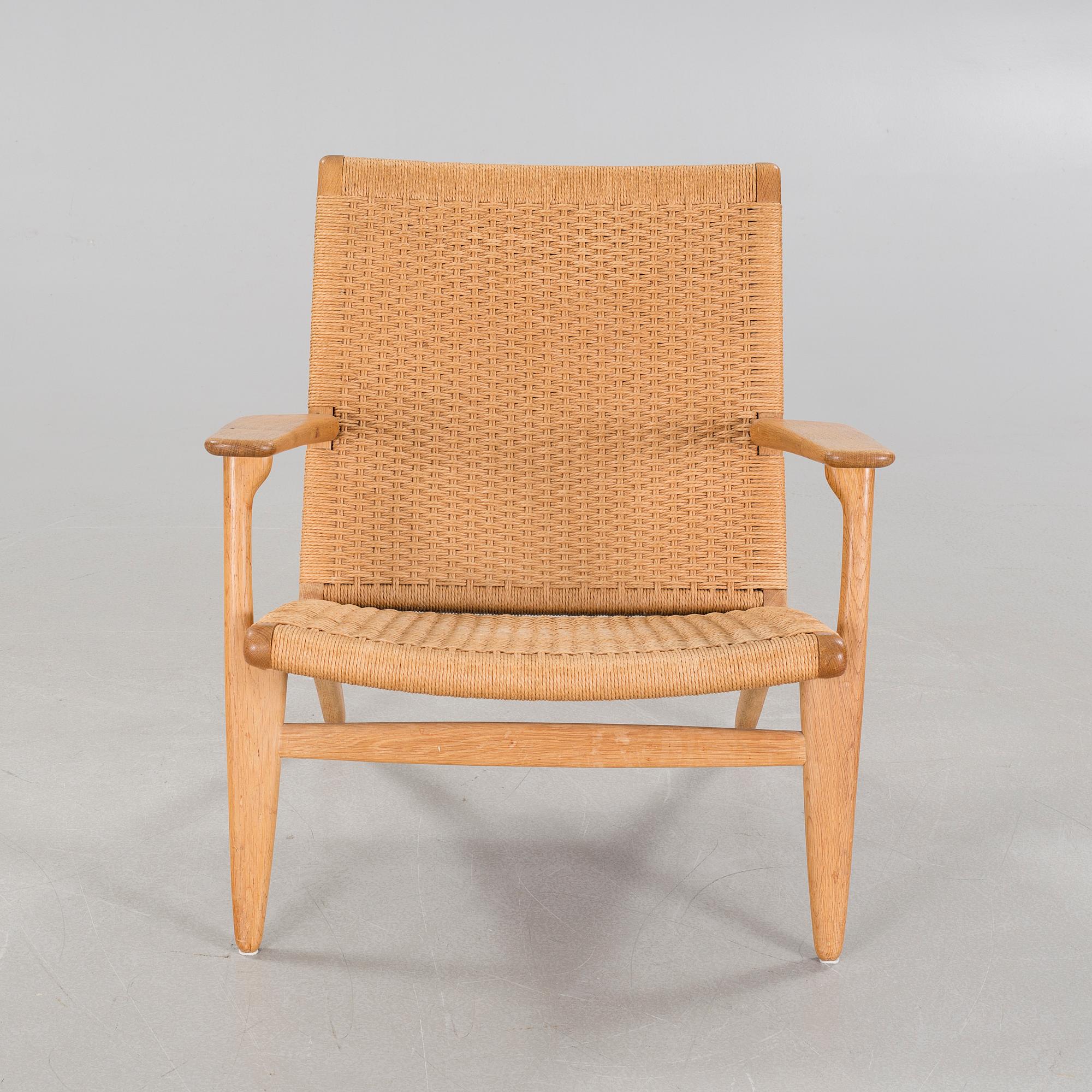 A lounge chair by Hans J Wegner, model "CH-25", for Carl Hansen & Son, Denmark, second half of the 20th century.