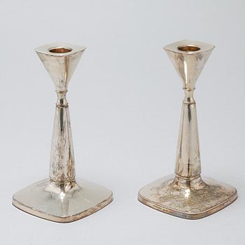 A pair of candlesticks by Thore Eldh for K&EC in Göteborg, 1960s.