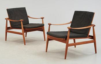 A pair of Finn Juhl teak easy chairs, France & Daverkosen, Denmark.