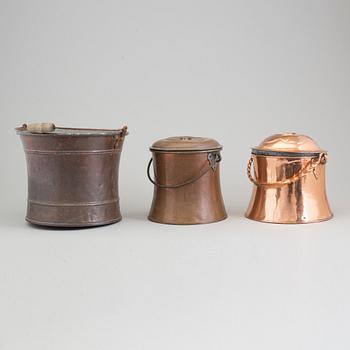 A COPPER BUCKET AND TWO MILK CHURNS, 19th century.