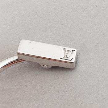 Louis Vuitton and Giorgio Armani, two pairs of cufflinks.