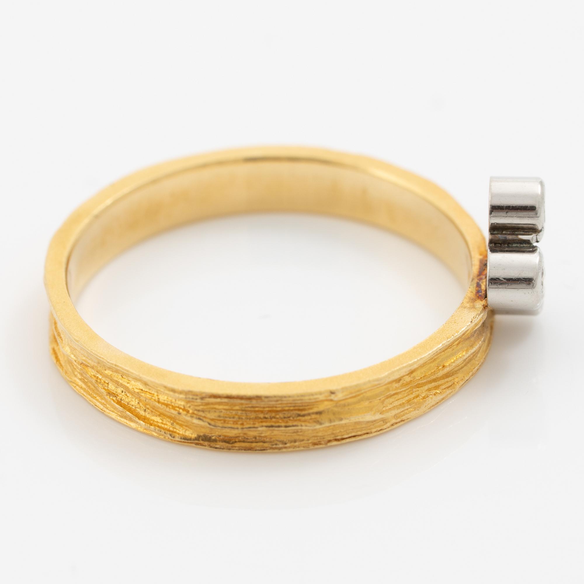 Lapponia, ring, 18K guld med runda briljantslipade diamanter, Finland 1976.